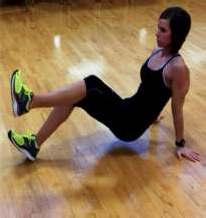 3. Swing dumbbell back between legs while sitting bodyweight back into your heels. 4.