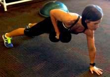 Push-up Position with Single Arm DB Row 1. Begin in the push-up position (facing the floor, up on hands and toes). 2.