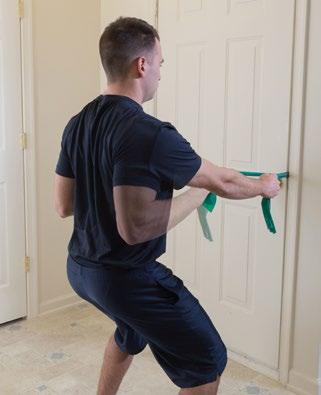 Shoulder External Rotation (Elbow In) Starting position: Attach an elastic band to a safe anchor point at about bellybutton height.