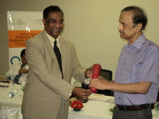 Sanjay Oak Dr Benny Negalur receives