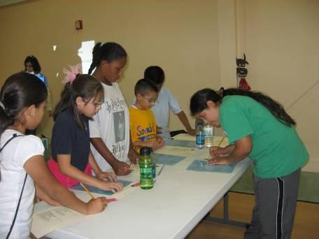 Students practice how to prepare an easy and nutritious snack.