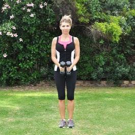 DB Side Raise Preparation: Grasp dumbbells in front of thighs with your elbows slightly bent. Bend forward slightly with hips and knees also bent slightly, while maintaining a neutral spine.