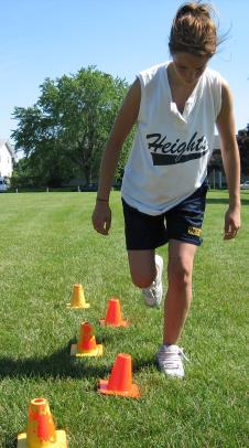 forward and laterally over the cone. Land on lead leg (opposite leg).