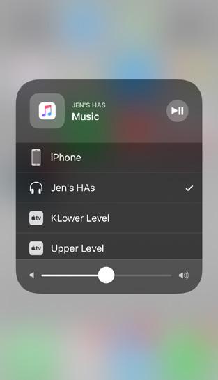 Tap AirPlay icon in upper right and select desired audio source (your name by headphone icon).