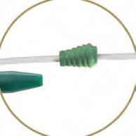 The system consists of two parts: the white guiding catheter with silicone sleeve and the green inserter fitted into the inner cannula of the tracheostomy tube.