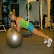 Place your elbows on top of the ball, extending and planting your feet for balance and keeping your body aligned in the