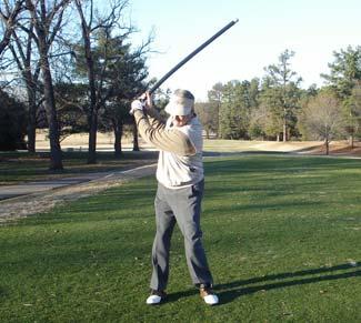 Swinging the Body Bar FLEX Hold one end of Body Bar FLEX as one would a driver or long iron.