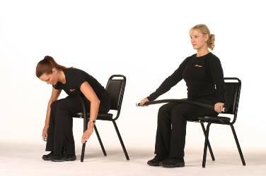Abdominal Crunch while Seated in a Chair Sit at the edge of a sturdy chair, with feet hip width apart. Place the Body Bar FLEX on top of the thighs and hold ends, palms facing down.