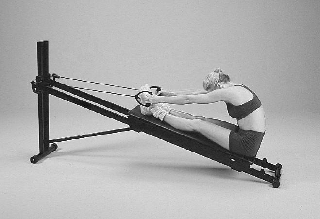 Hamstrings, Lower Back #11 Seated Bench Press Grasp handles. Sit at top of glideboard facing away from height adjustment column. Put your legs on the glideboard. Bend elbows.