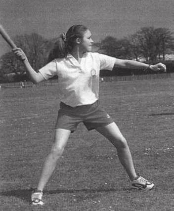 18. Emma is a fast runner and enjoys playing rounders (a) Figure 12 shows one of the members of the rounders team preparing to hit the ball. Figure 12 (i) Name the bones of the upper and lower arm.