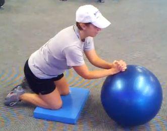 Stability Ball Rollout Kneel on a mat and place your clasped hands on the top of a