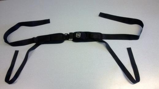 Loop each of the upper, wider straps of the 4 point harness around this bar on either side Thread the straps back through the black plastic sliders located on the straps to secure their position.