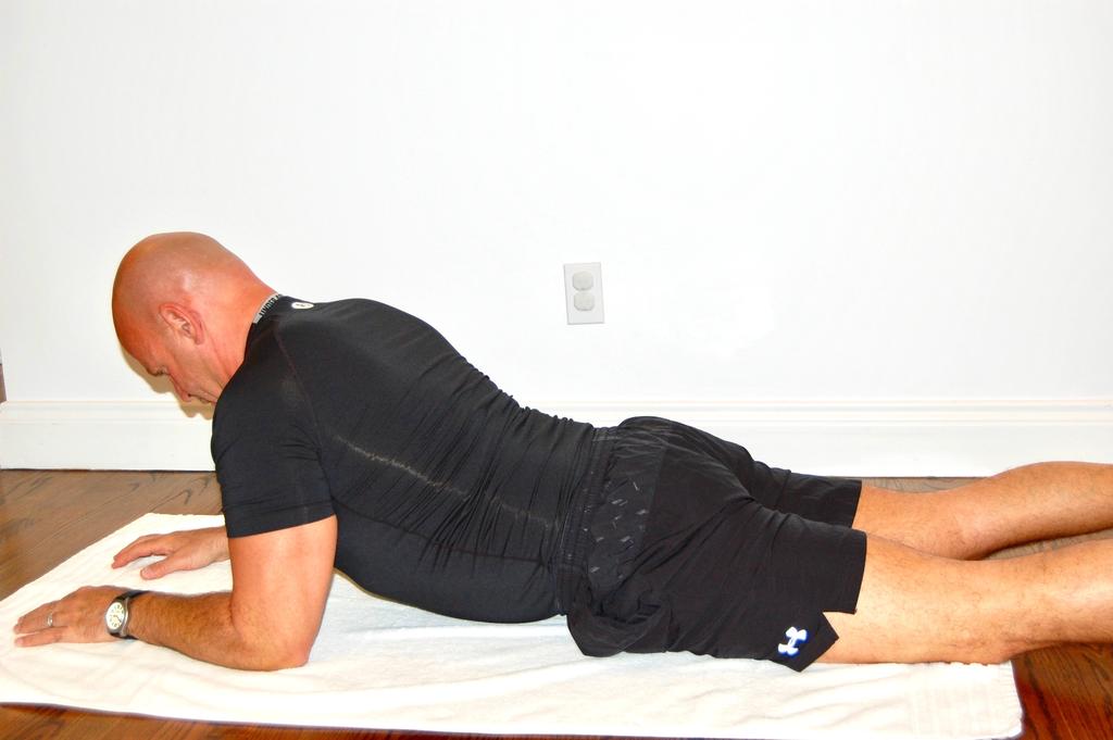 Lying Hyperextension This exercise strengthens the muscles in your lower back reduces lower back soreness Lie on the floor on your belly and your forearms Lift your upper body up and then back toward