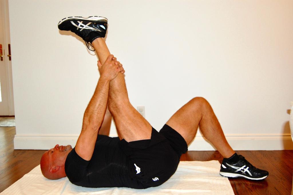 Hamstring Stretch This exercise stretches your hamstrings and reduces lower back soreness Lie on rug with good posture Raise your right foot to the ceiling Grasp the back of your
