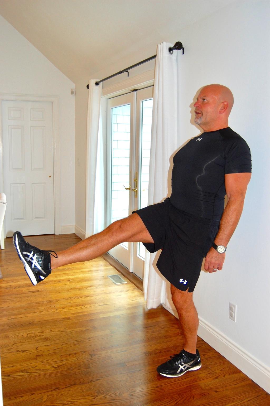 Standing Straight Leg Lift This exercise strengthens the muscles in your front hip to stabilize your