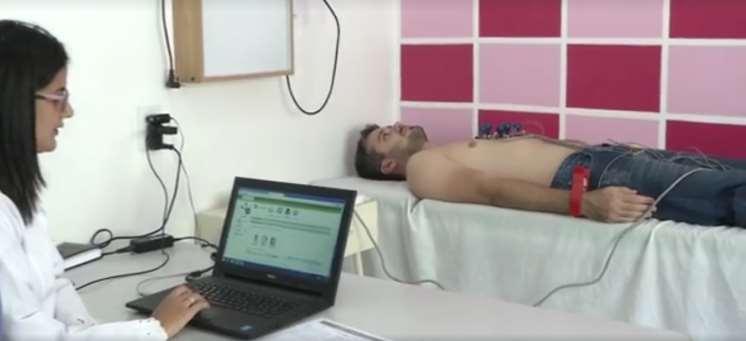 Figure 1. Electrocardiogram test being performed on a patient.