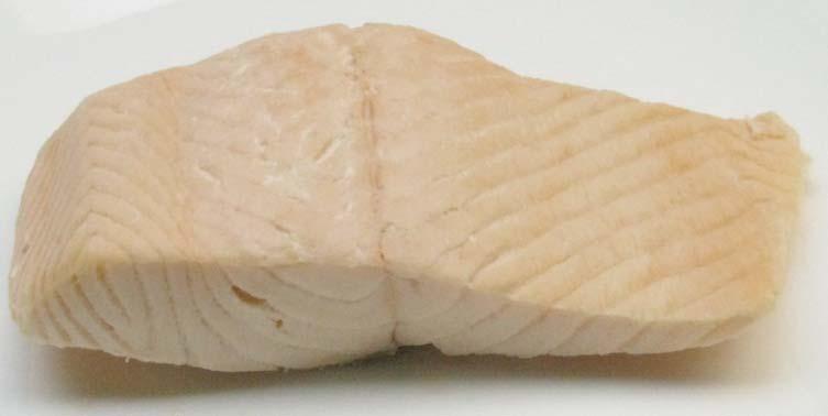 In order to flake the fillet, take the fork and gently pull back on the segments in the thickest portion of the fillet to determine if the muscle segments separate easily, and if they do not, then