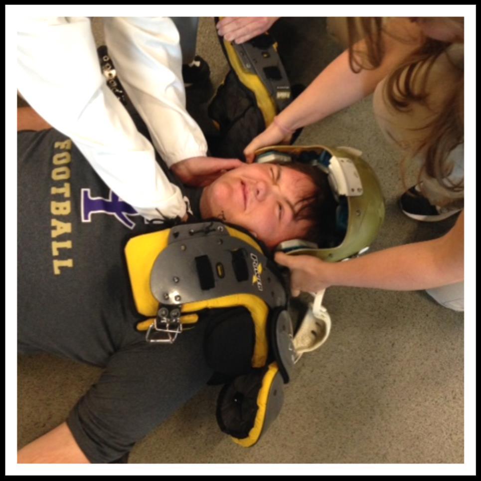 While maintaining cervical spine immobilization, a provider will place her