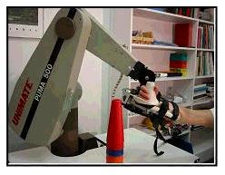 Use of Robotic Devices to Treat Stroke Impairment 27 Figure 3. Mirror Image Movement Enabler (MIME).