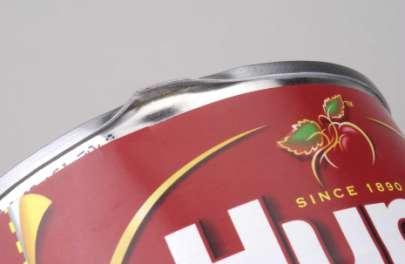 Sharp Dent Peeled Seam Accept cans with a long and flat dent on