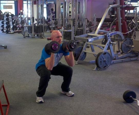 Finishers 1-4 DB Squat and Press Hold a pair of dumbbells at
