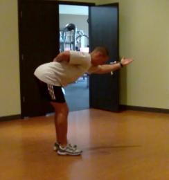Keep your chest up and out all the time, and tilt forwards from the hips while raising the rotating one arm.
