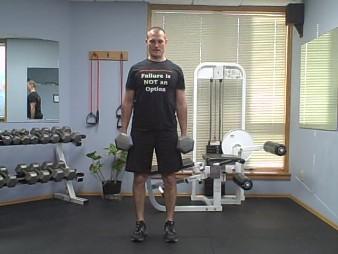Deadlift (Dumbbells) Coaching Tips: Start with the dumbbells comfortably positioned at your hips with palms facing in.