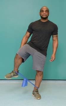 Resisted hip movements against resistance band Stand with your feet hips