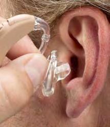 earmold insertion and removal Before placing the BTE with an earmold into your ear, be