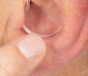 Use your fingertip to push the lock into a secure position in the bowl of your ear.