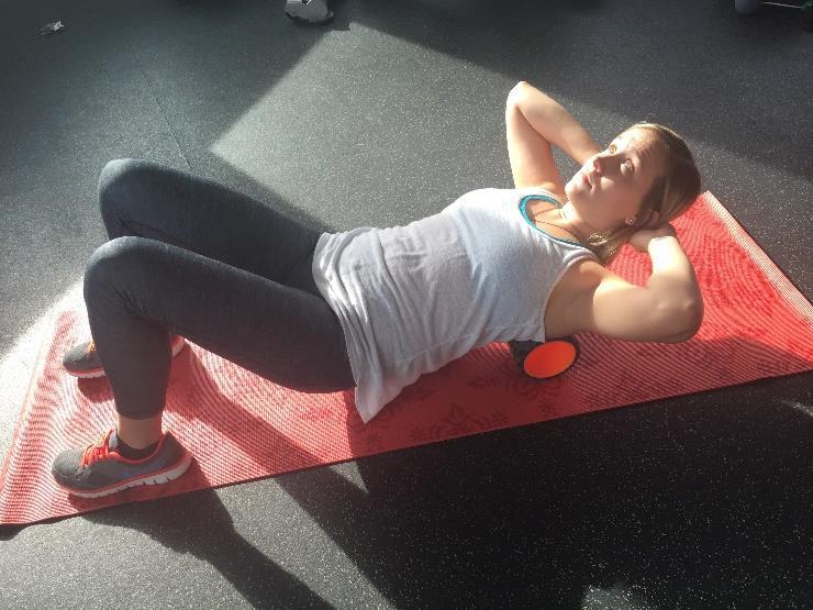 day. Place the foam roller in the middle of the thigh and roll upwards towards the hip bone and downwards to the knee.