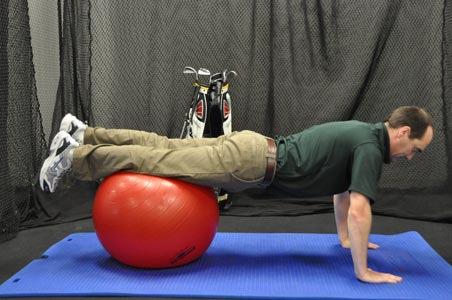 Walkout facedown on a Swiss ball, while stabilizing your core (no excessive arch in