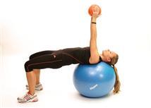 Head and shoulders positioned on the stability ball, allowing chin to point to ceiling. Shoulders, hips and knees in common alignment.