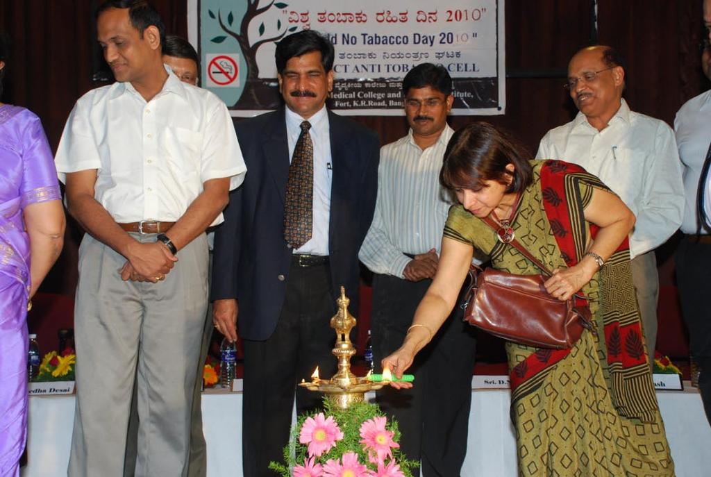 Lighting of the lamp by dignitaries-health secretary, Director, NRHM Director, HOD Com Med and Health Commissioner Release of media Kit