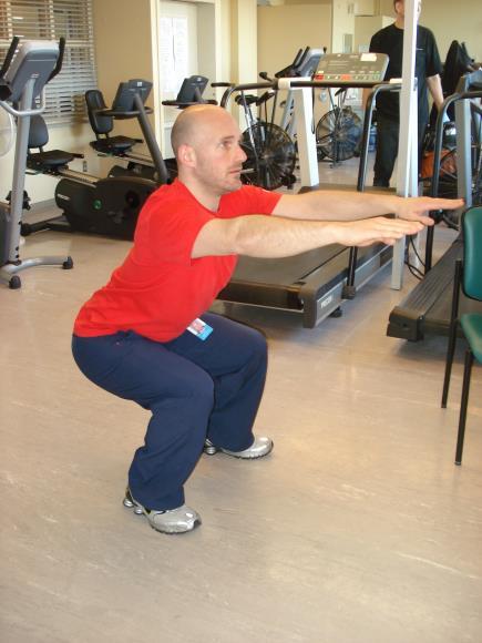 Movement: Bend knees until your thighs are slightly above parallel to the floor.