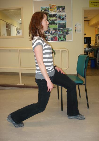 Quadriceps Stretch Area stretched: Thigh Stand with one foot in front of the other with feet slightly