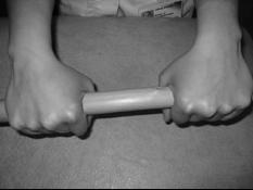 c) Grip strength exercise For this exercise you will need a small towel or ball such as a squash or tennis ball.