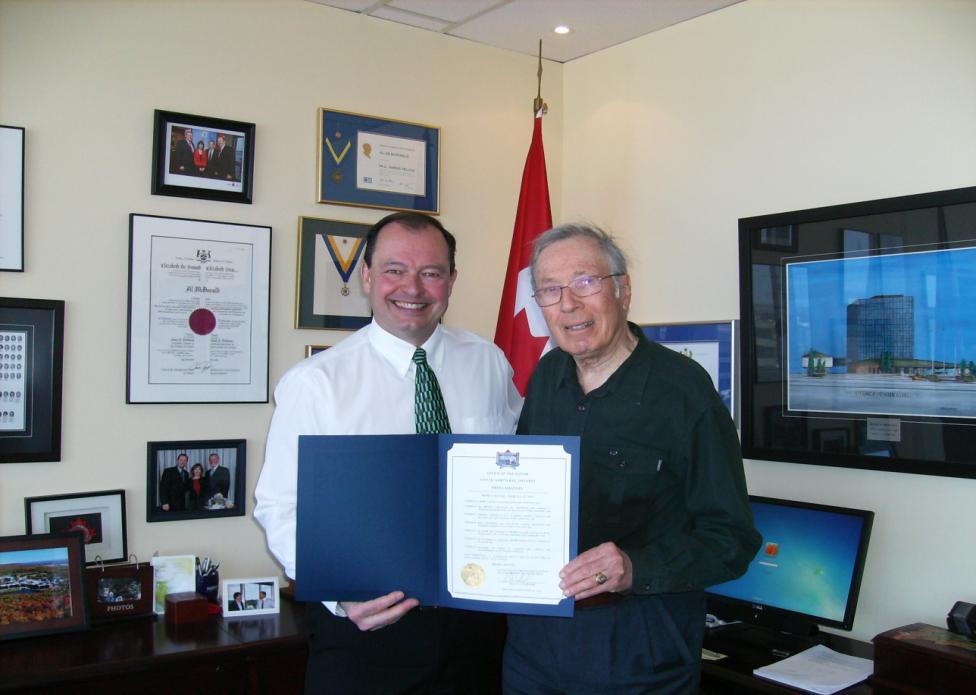 Mayor Al Mcdonald signs proclamation declaring March National PROBUS Month.