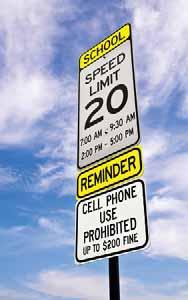 In some states, a driver of a vehicle may not use a handheld cell phone while driving.
