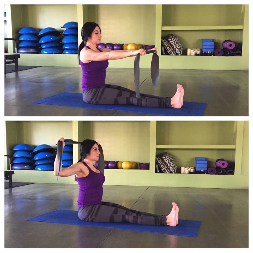 Band W Rotation Holding a stretch band in both hands. Sitting straight up extend both legs straight out in front of your body with heels firmly pressed on the floor.