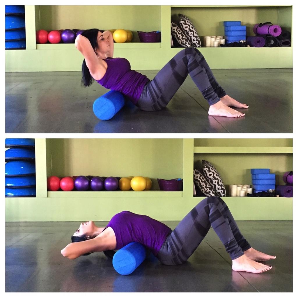 Mid Back Foam Roll Use a foam roller for this movement. Begin by laying your mid back down on the roller. Both feet firmly pressed on the floor. Hands interlaced behind your head.
