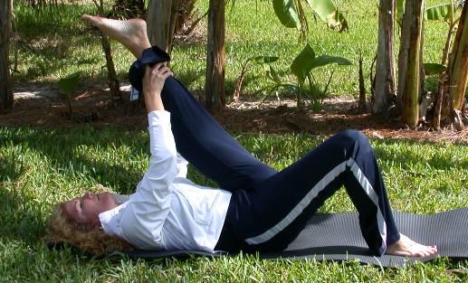 Hamstring stretch (Left, right, left, right) Lie on your back on your mat with your arms to the sides, your knees bent, and your feet flat on the floor.