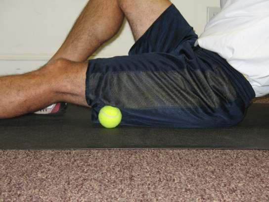 25 Place the ball against a wall or on the floor. Place the ball on the hamstring (back of the leg).