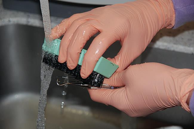 Cleaning and Disinfection Following patient treatment and before returning instrument cassettes to a receiving area, the resident/student will remove any