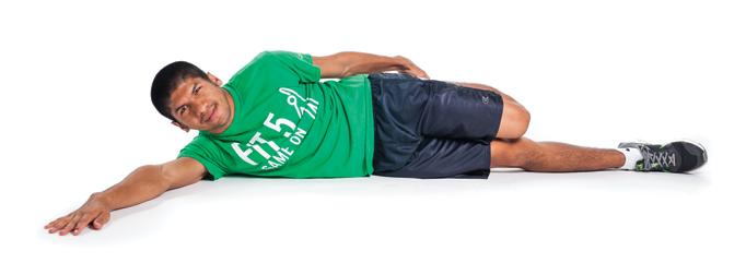 Flexibility Quadriceps Stretch 1. Lay on the ground on your right side. 2. Bend your left knee.