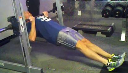 Row yourself up the top position with your upper back and lats.