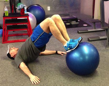 your cheeks. Bridge your hips up by contracting your glutes.