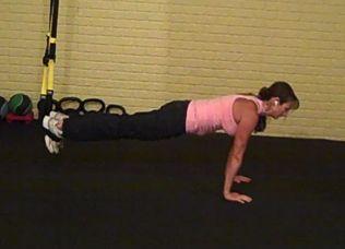 Pause and then push back up Repeat as necessary TRX Atomic Pushup Keep the abs braced and body in a straight line