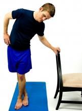IT Band Stretch In a standing position, cross the opposite leg in front of the target leg.