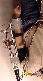 1 Th attach xoskltal robot Ballscrw fram Link 1 Elctro - Elctro + Elctro groun Link 2 (a) Bicps